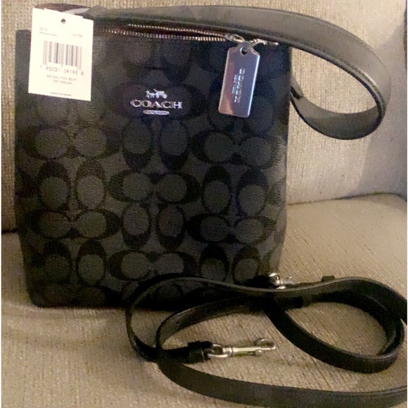 Still have tags never used small coach purse - Picture 2 of 2